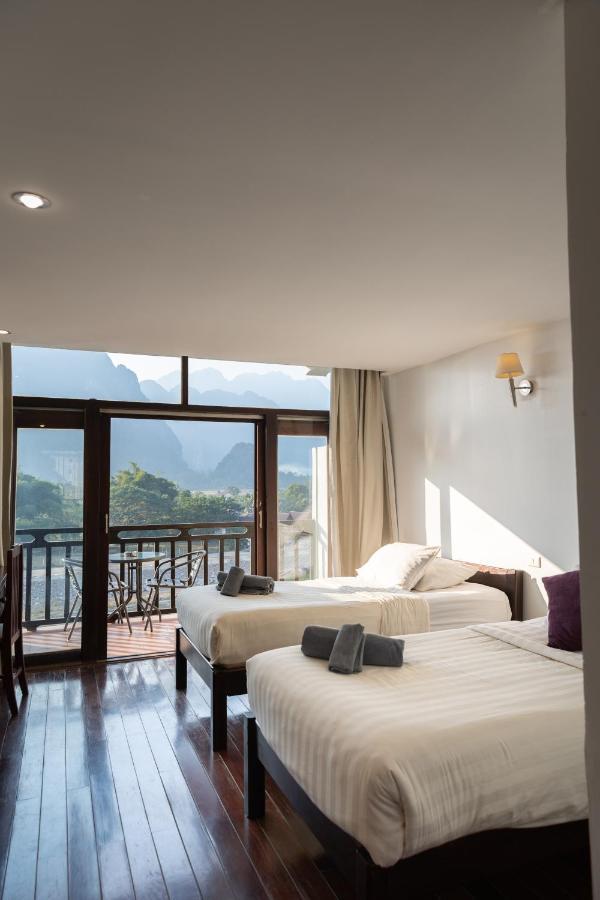 Silver Naga Hotel Vang Vieng Bagian luar foto